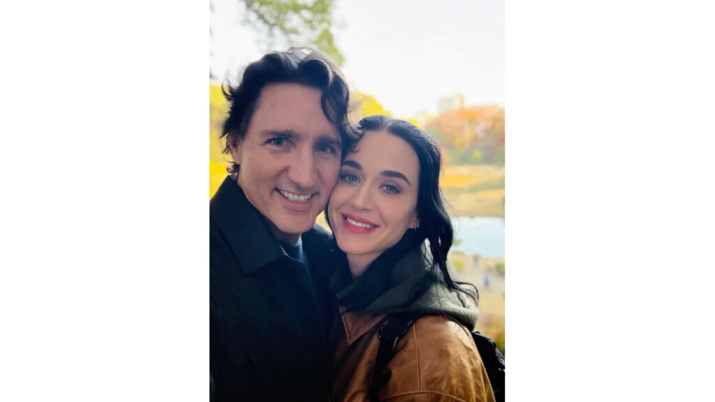 Justin Trudeau and Katy Perry standing closely.