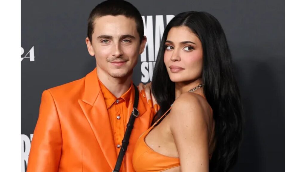 Kylie Jenner and Timothee Chalamet in maching tangerine outfits