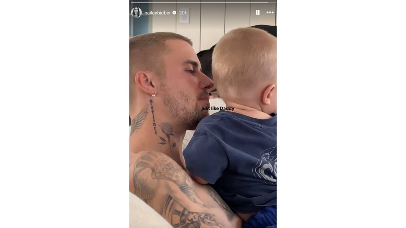 Justin Bieber holding his son Jack.