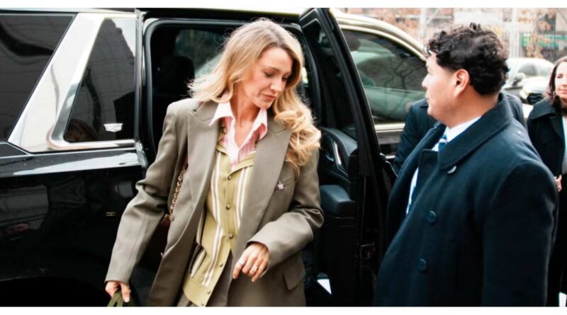 Blake Lively getting out of the car.