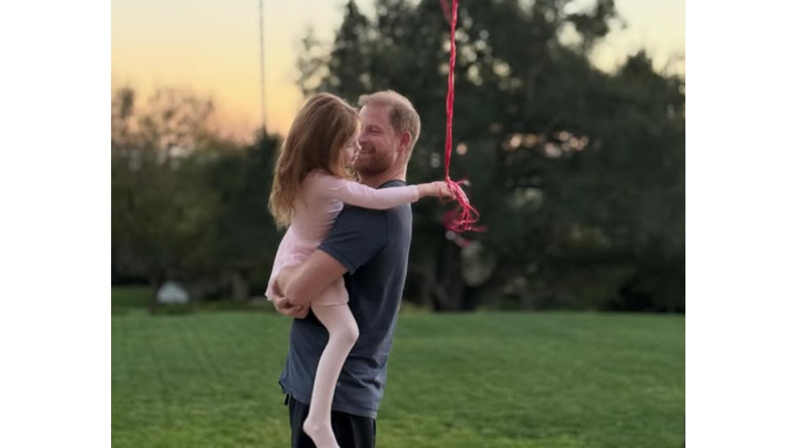 Prince Harry with his daughter, Princess Lilibet.