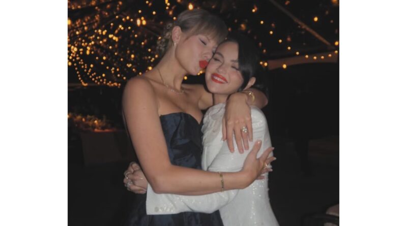 Selena and Taylor hugging.