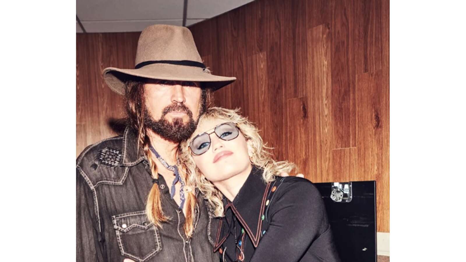 Miley Cyrus and Billy Ray Cyrus.